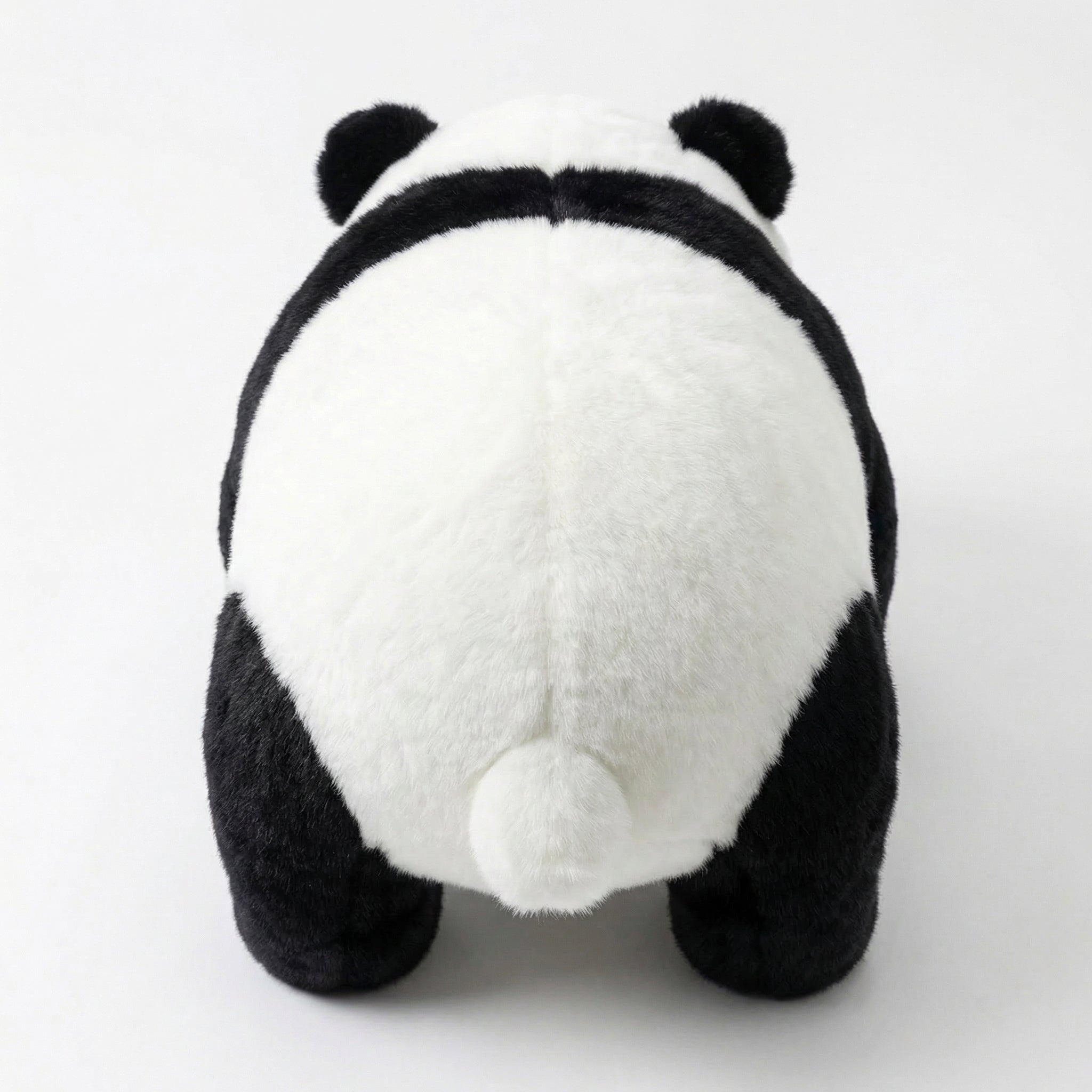 Crawling Panda Plush Stool – in living room setting